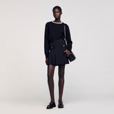 Mini skirt with stitched pleats Black Sandro Women