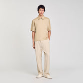Zip-neck polo shirt Sand. Sandro Men