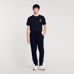 Joggers with snake detail Black Sandro Men