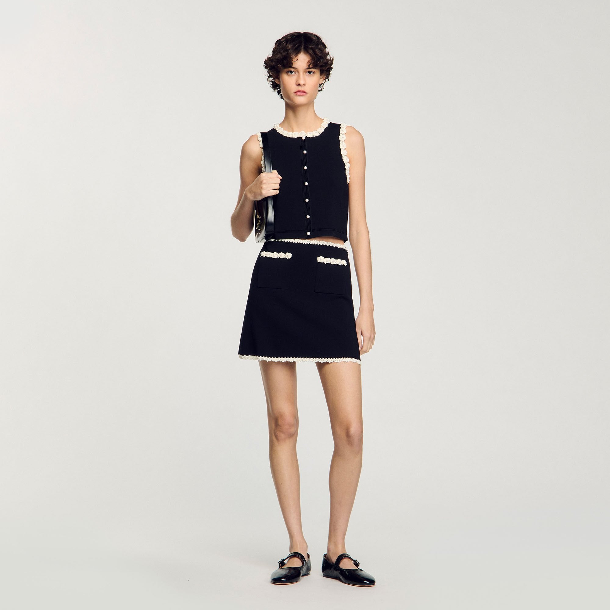 Mini skirt with crochet details Black Sandro Women