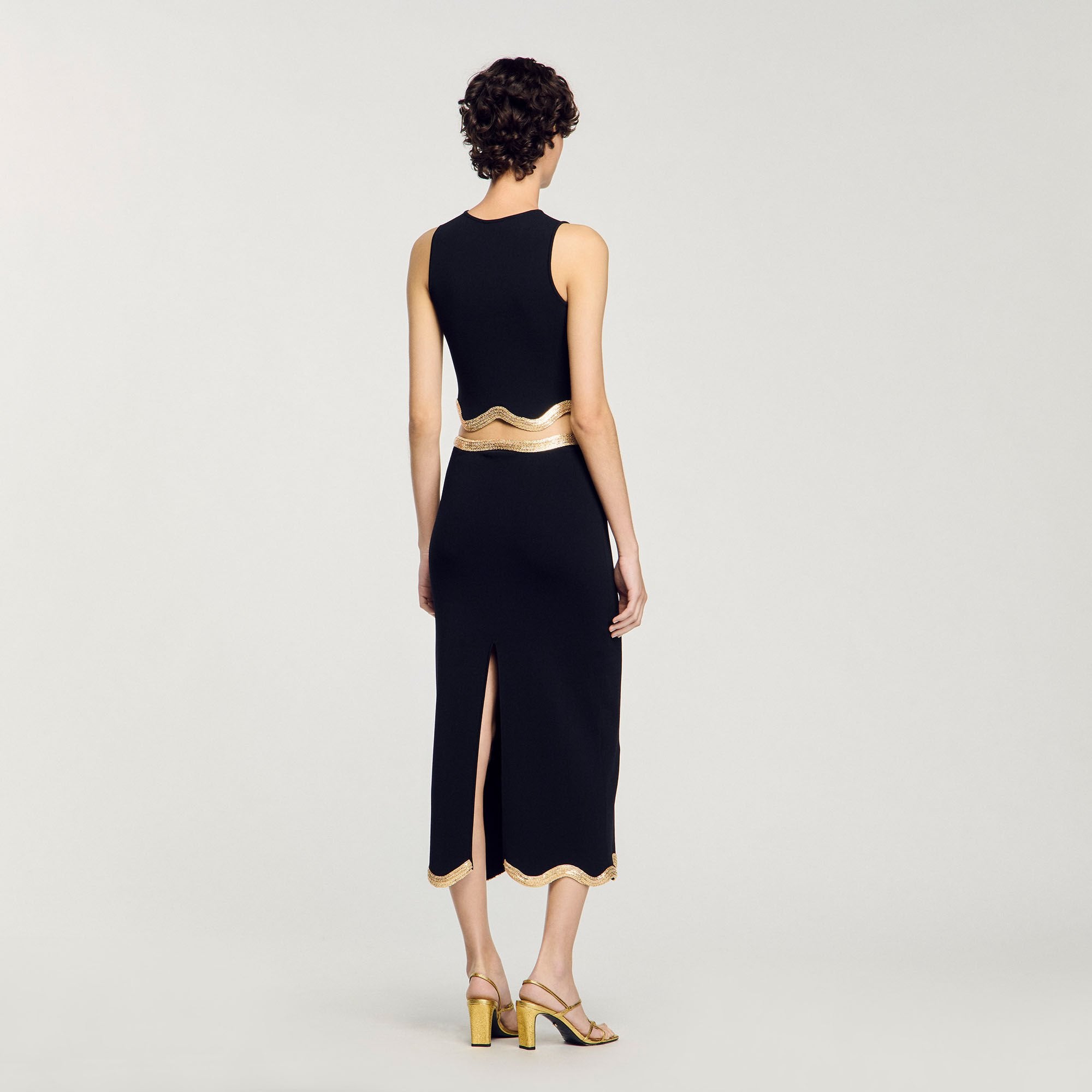 Maxi knitted skirt with chain detail Black Sandro Women