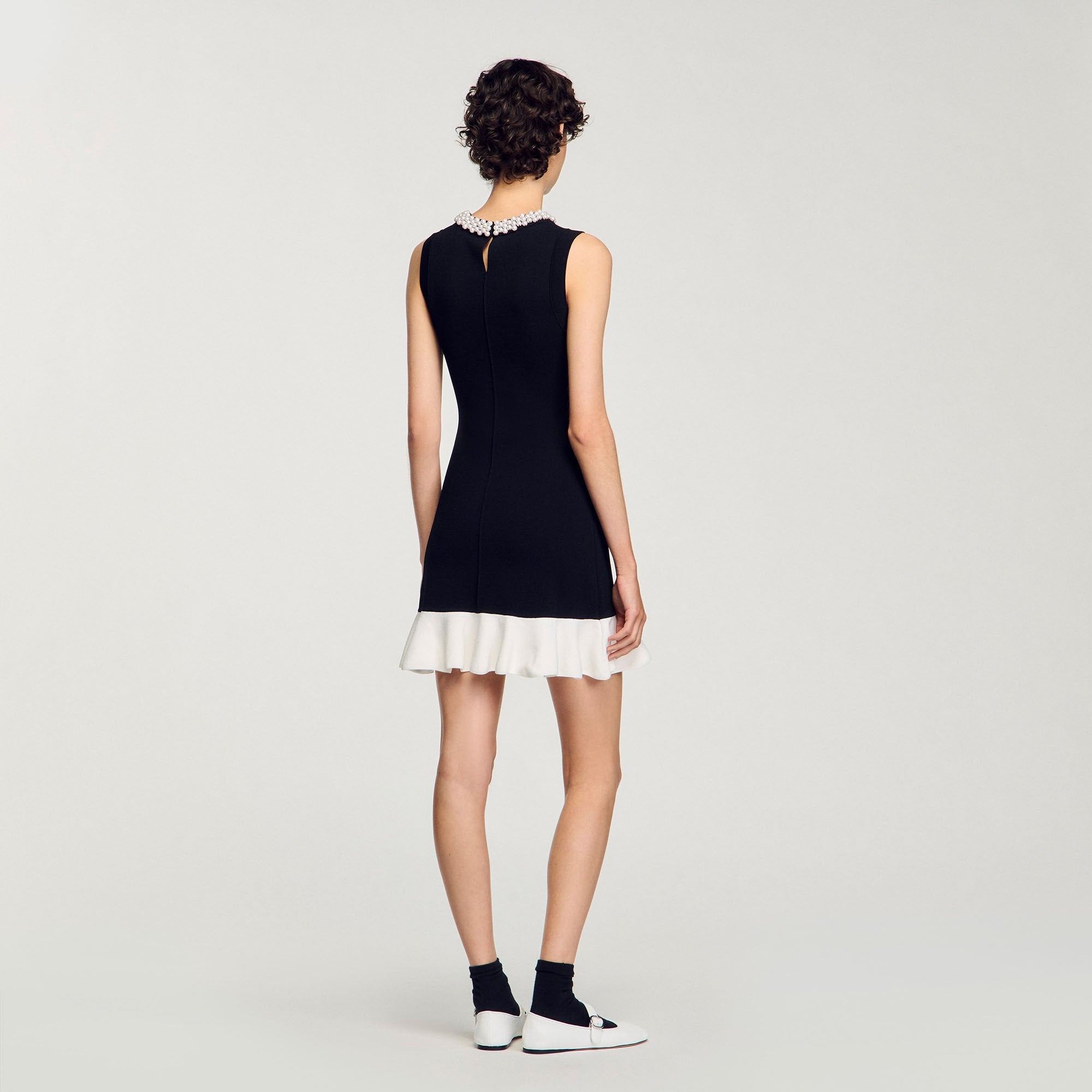 Mini knit dress with beaded neck Black / Ecru Sandro Women