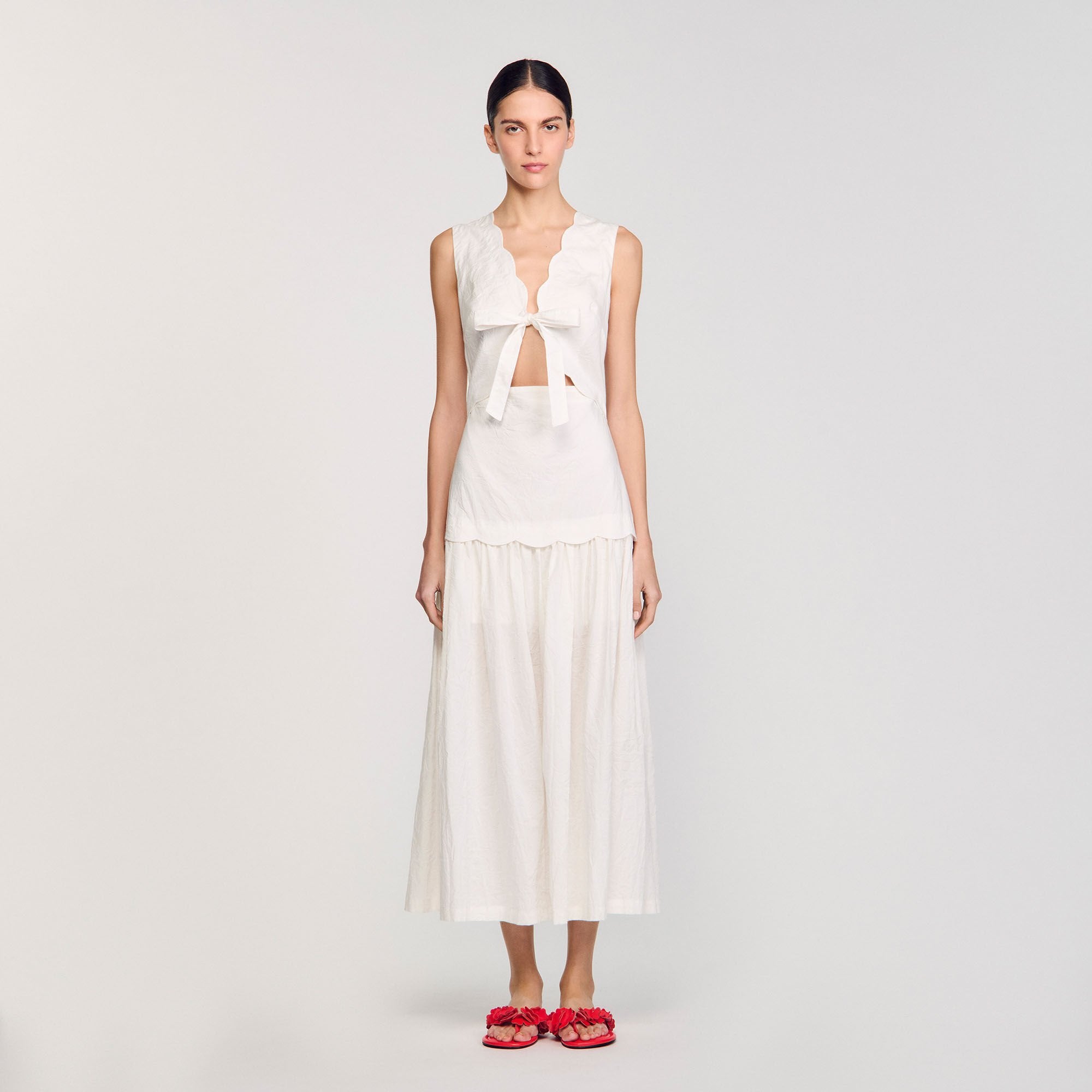 Crinkled maxi dress with bow Ecru Sandro Women