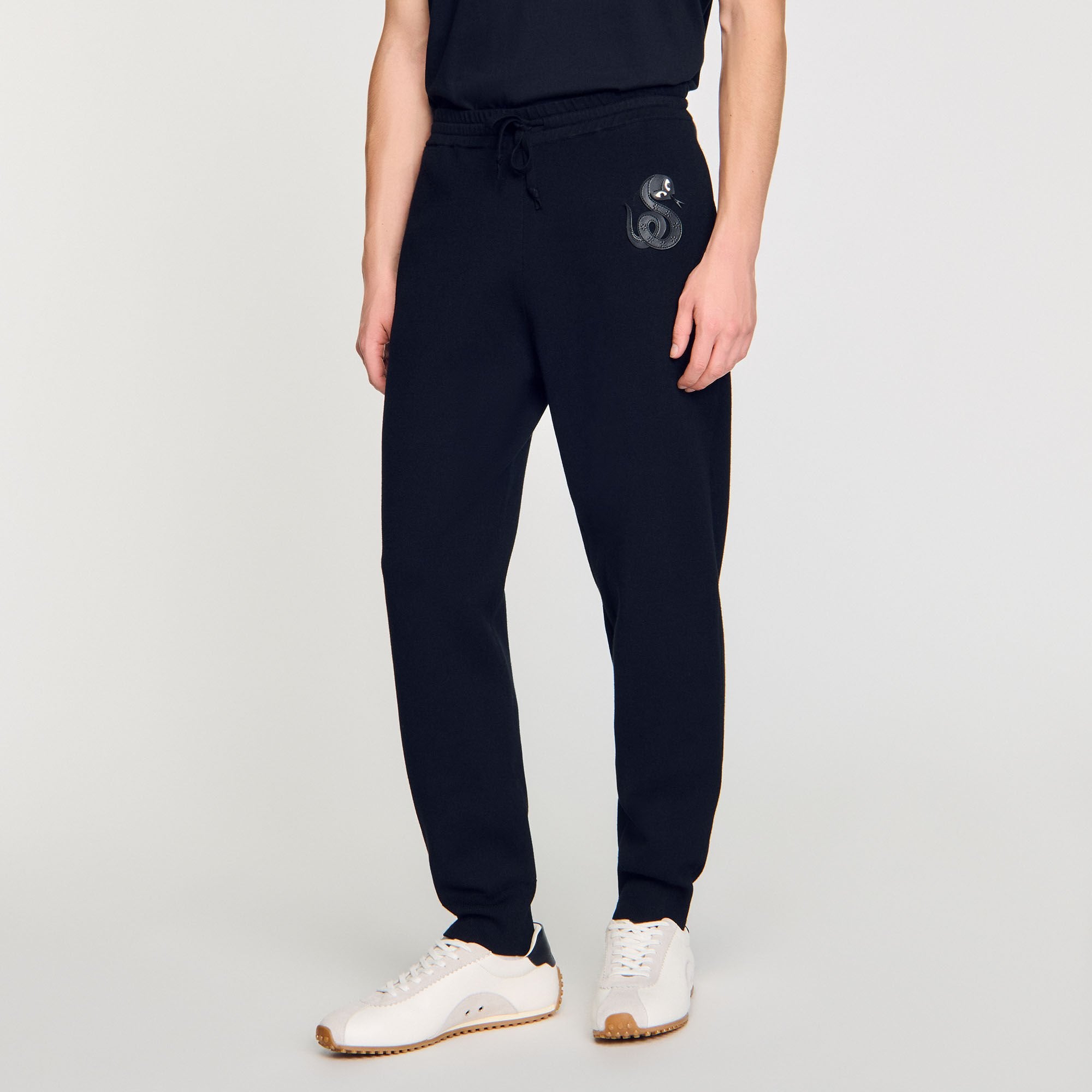 Joggers with snake detail Black Sandro Men