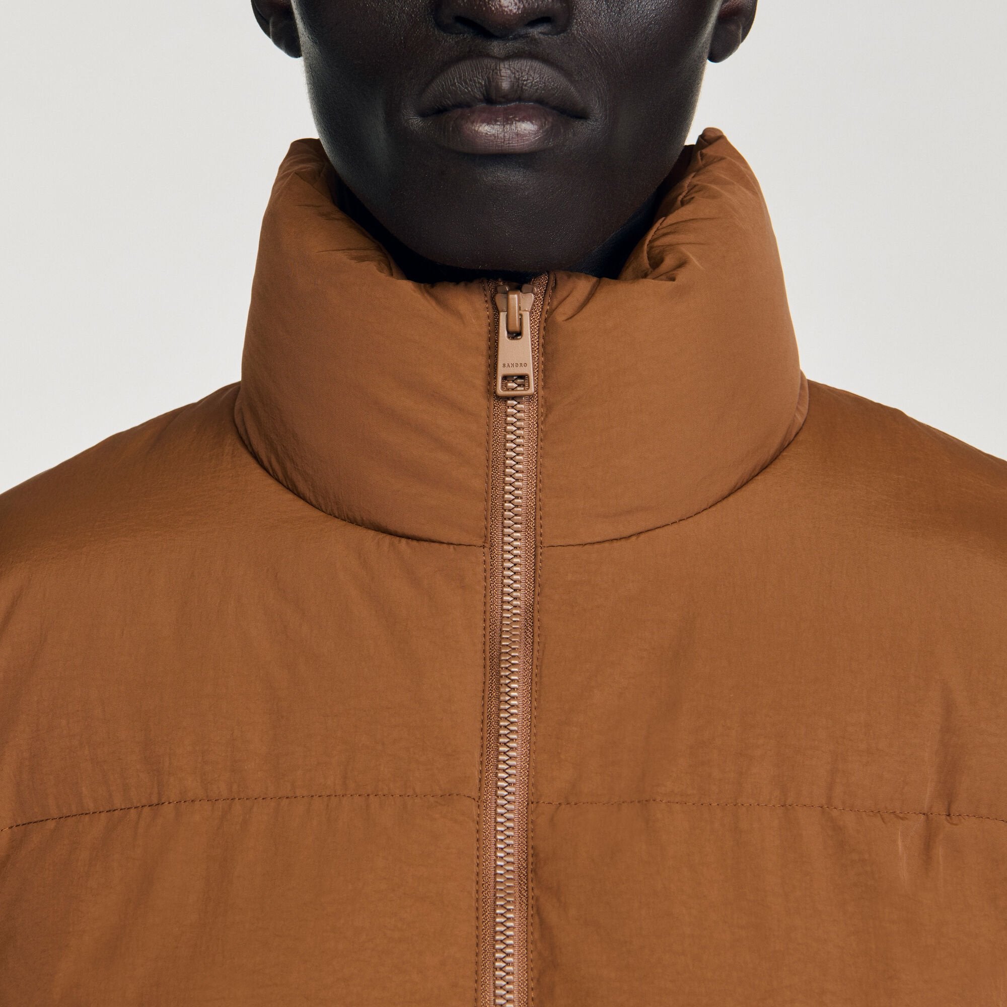 Hooded puffer with high collar Cognac Sandro Men
