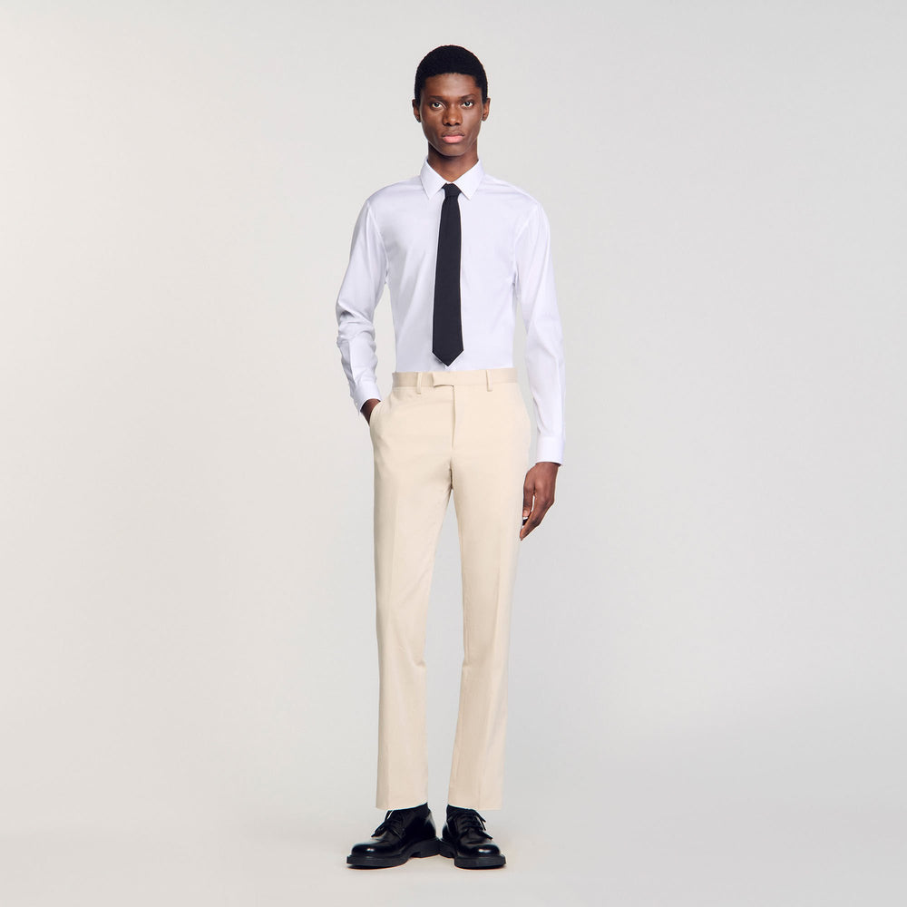 Suit trousers Ivory. Sandro Men