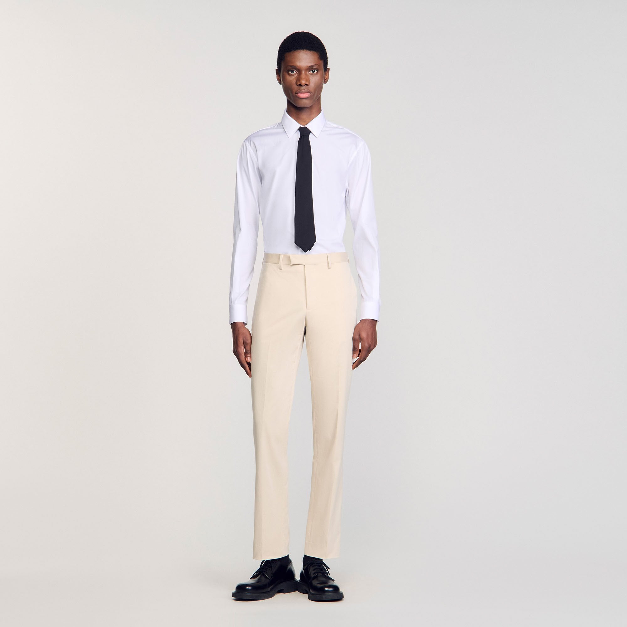 Suit trousers Ivory. Sandro Men
