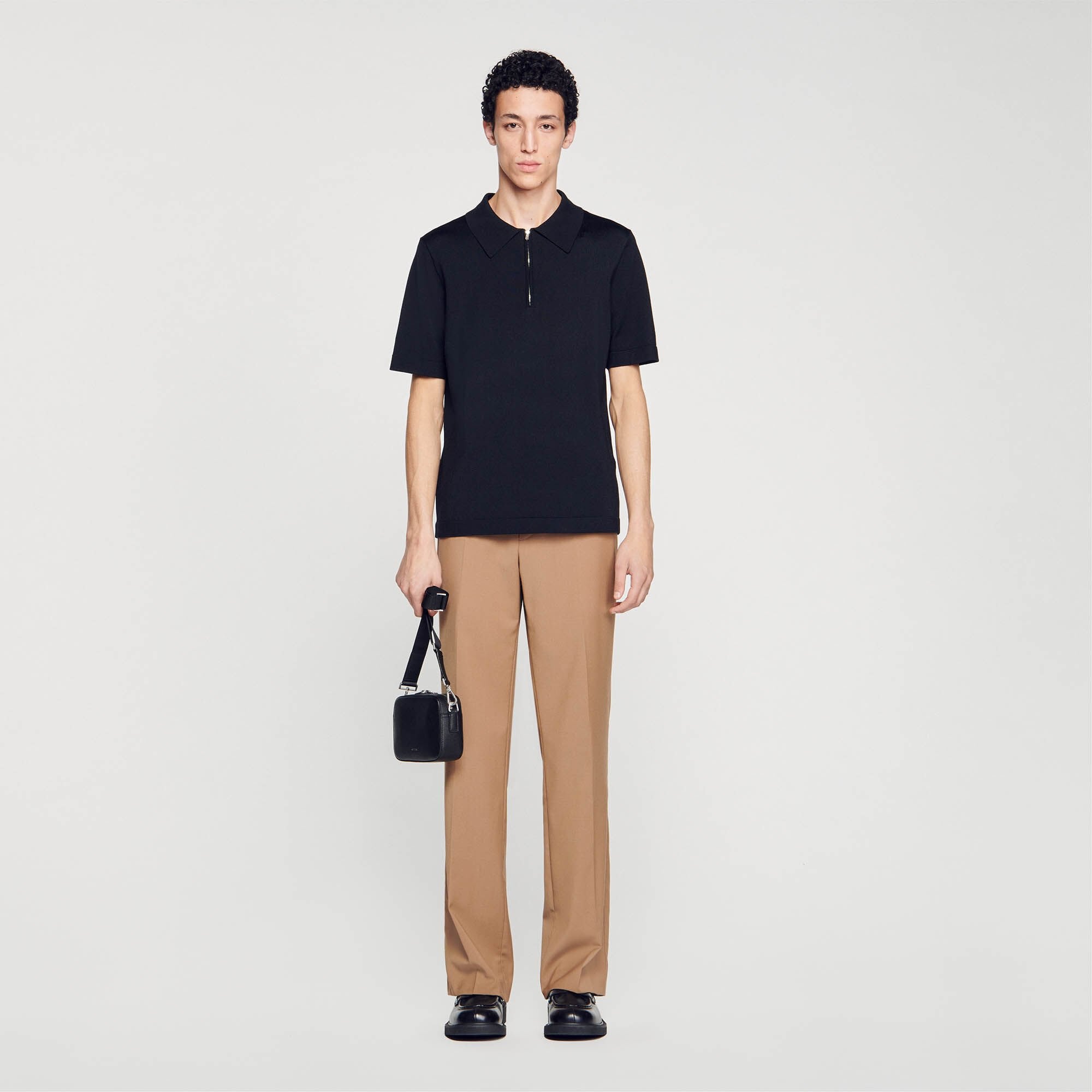 Knitted polo shirt with zip collar Black Sandro Men