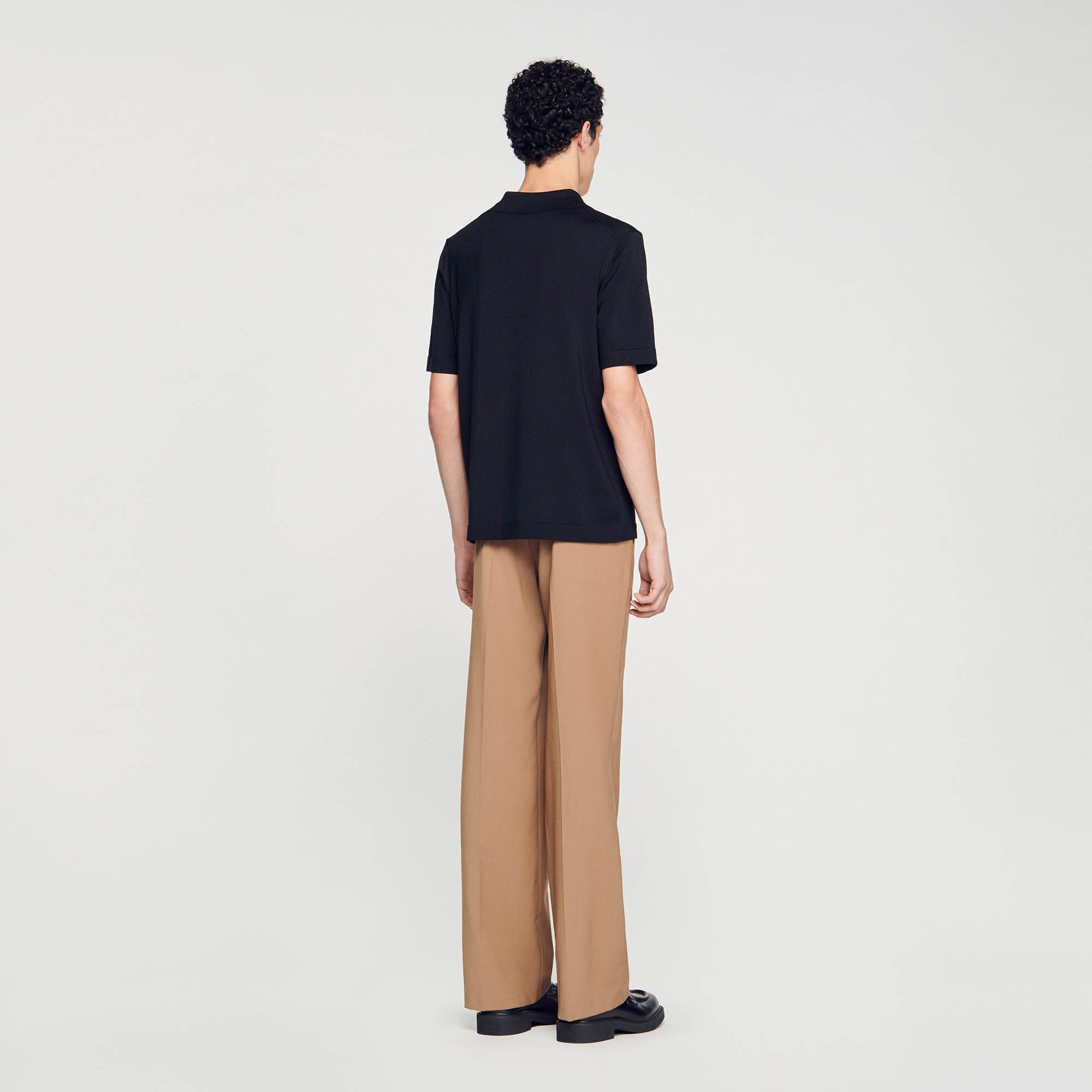 Knitted polo shirt with zip collar Black Sandro Men