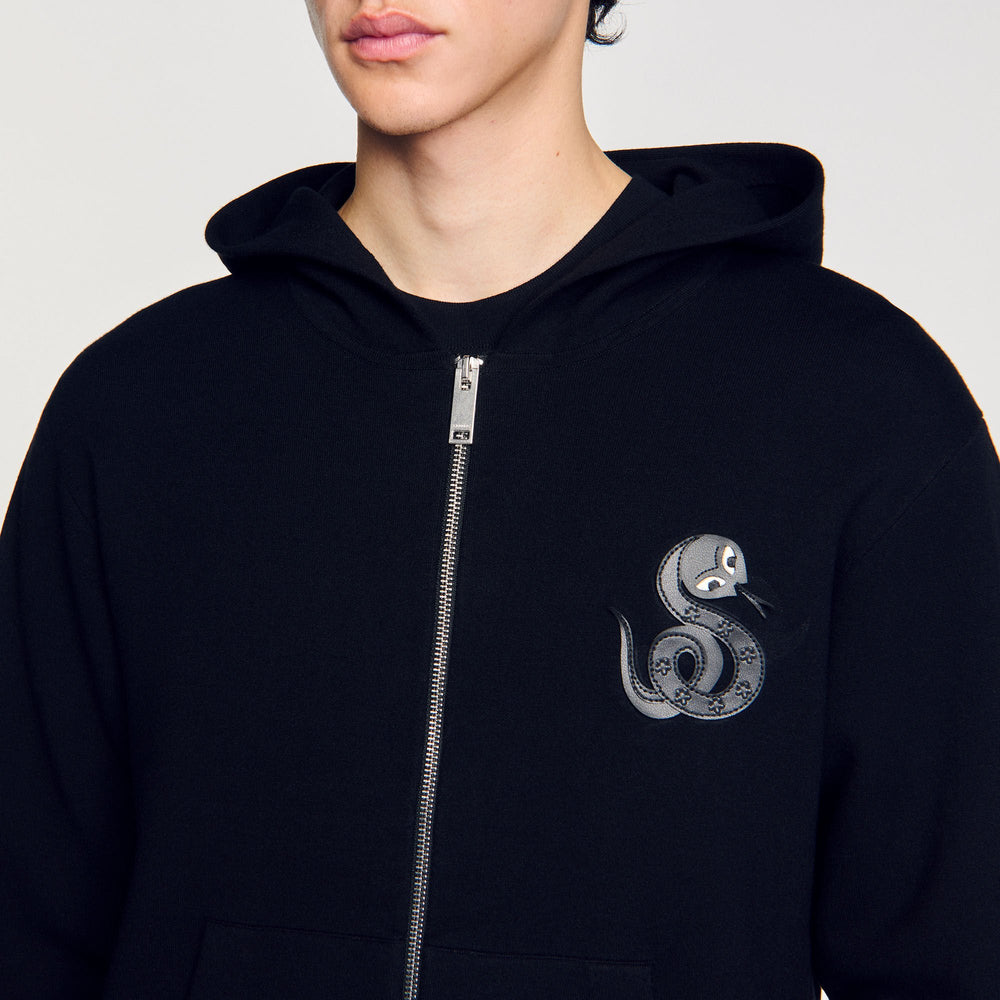 Zip-up cardigan with snake detail Black Sandro Men