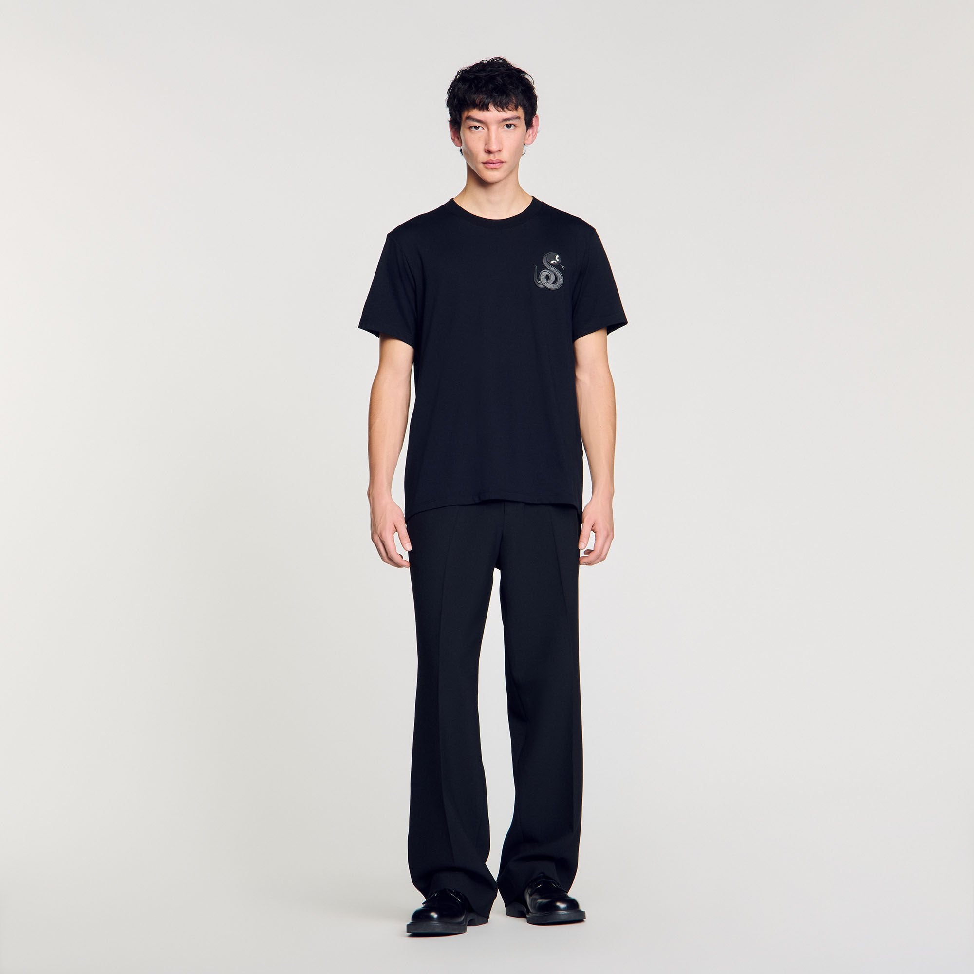 T-shirt with snake detail Black Sandro Men