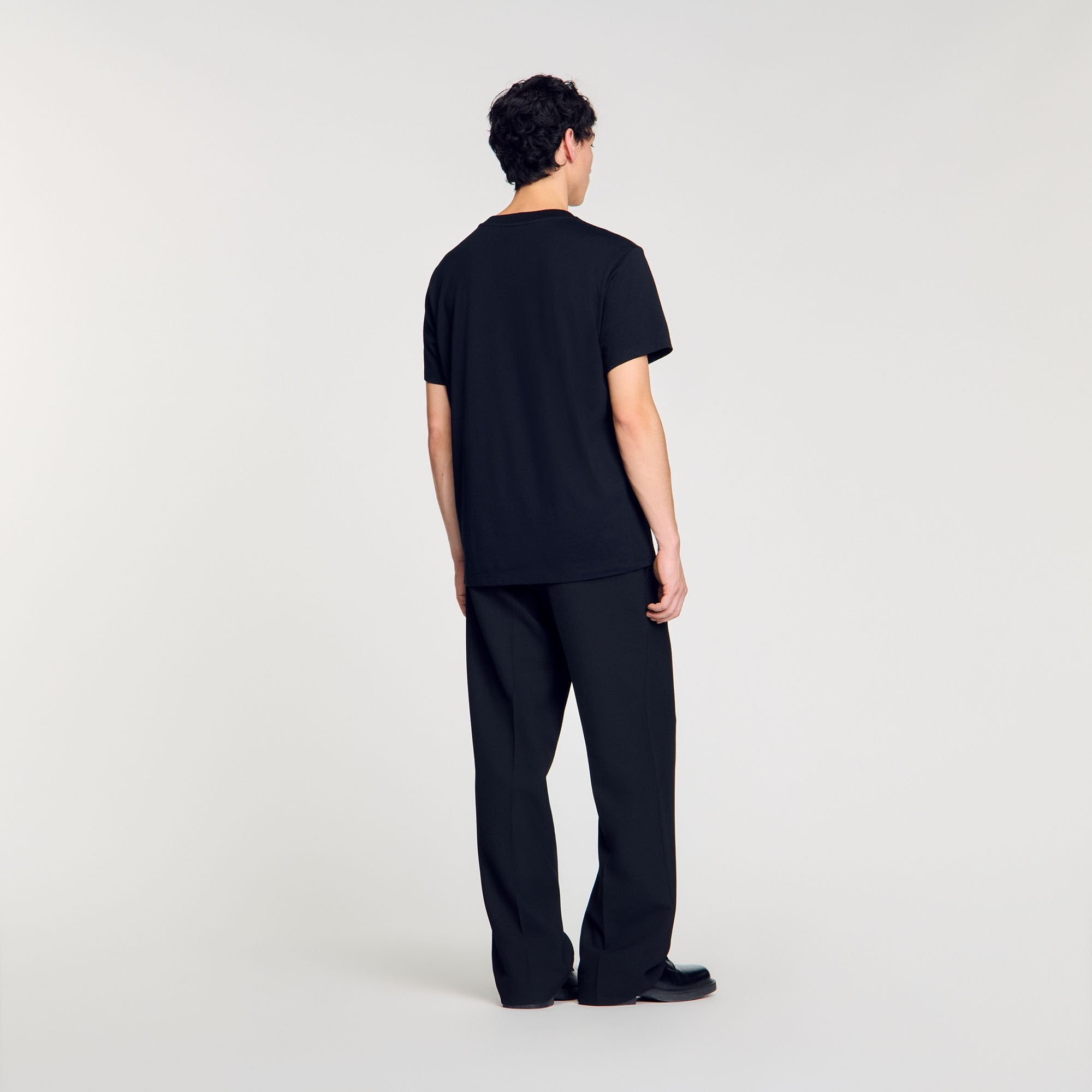 T-shirt with snake detail Black Sandro Men
