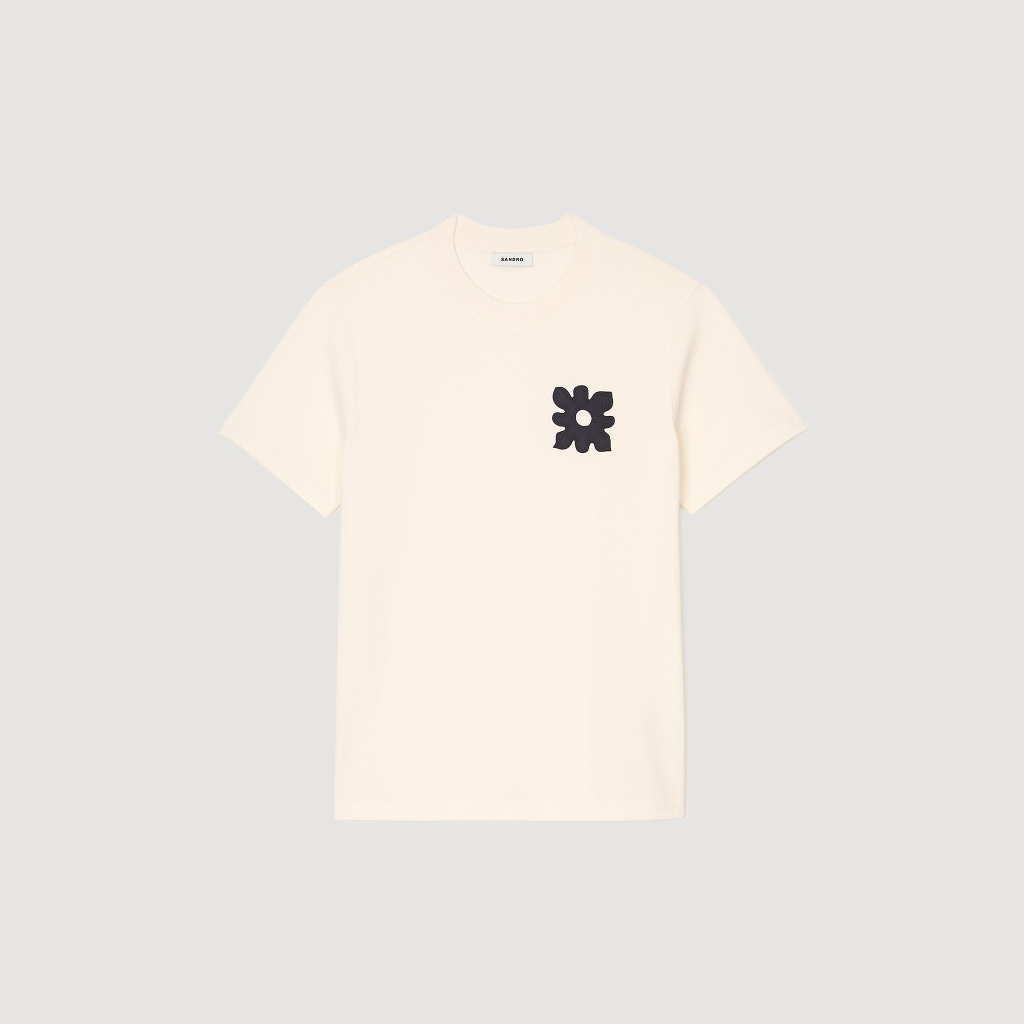 T-shirt with flower detail Ivory. Sandro Men